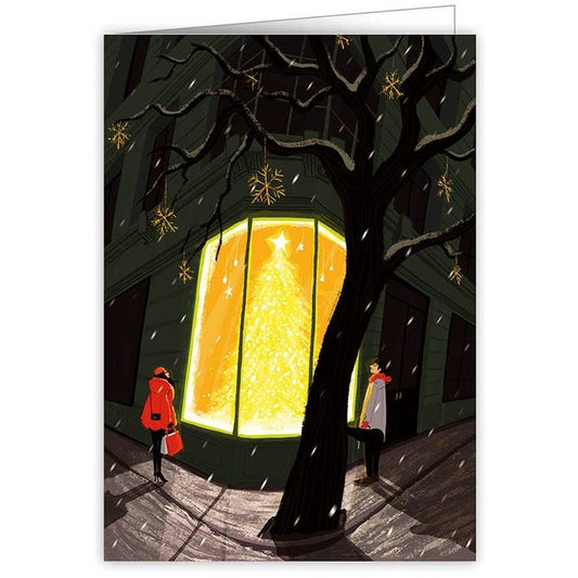 Couple Looking At Lit Tree In Shop Window